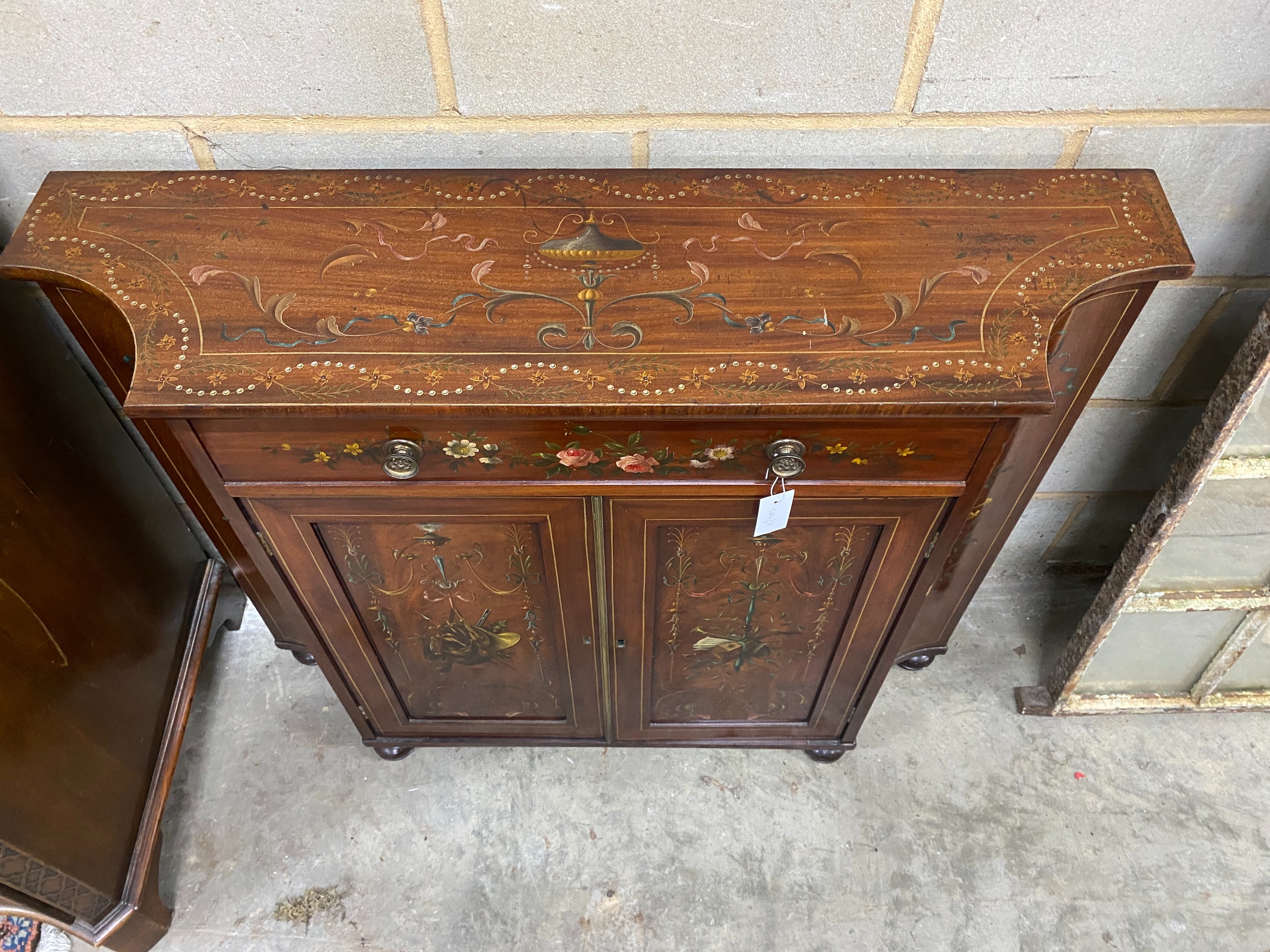 A George III and later Sheraton style painted mahogany breakfront side cabinet, width 112cm, depth 31cm, height 92cm